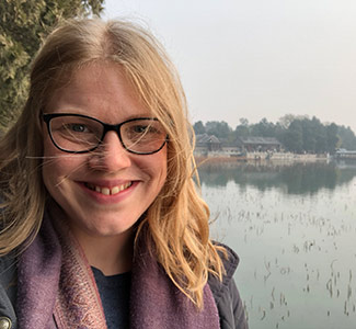 Lucy Barker pictured in the Black Forest, Freiburg Woman standing by lake