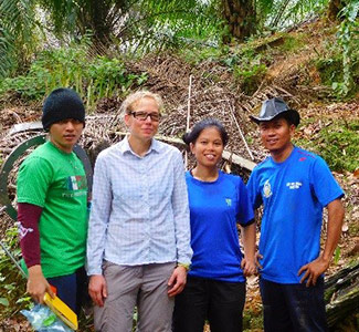 Julia Drewer, second left. 4 people in a tropical forest