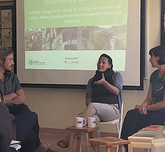Juliette Young (centre) leading a discussion group People in conversation