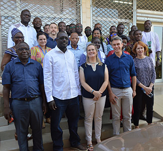 Tanya (front) with colleagues on the AMMA-2050 project Grroup of people standing outside a building