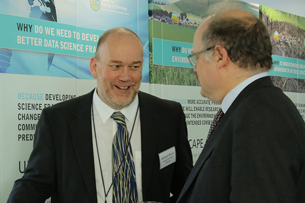 Richard talking to Sir Mark Walport during visit 2019