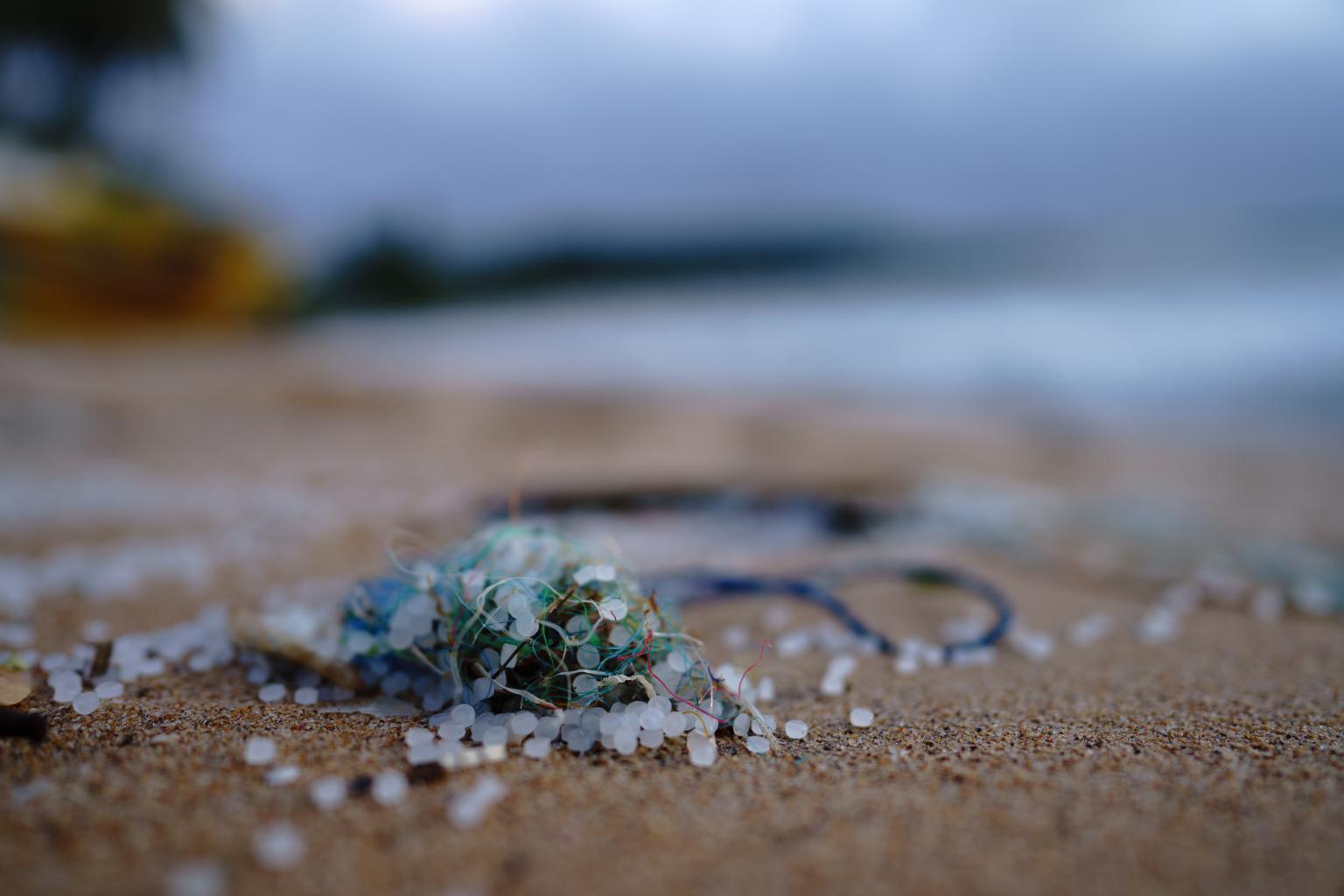 Microplastic particles on a beach