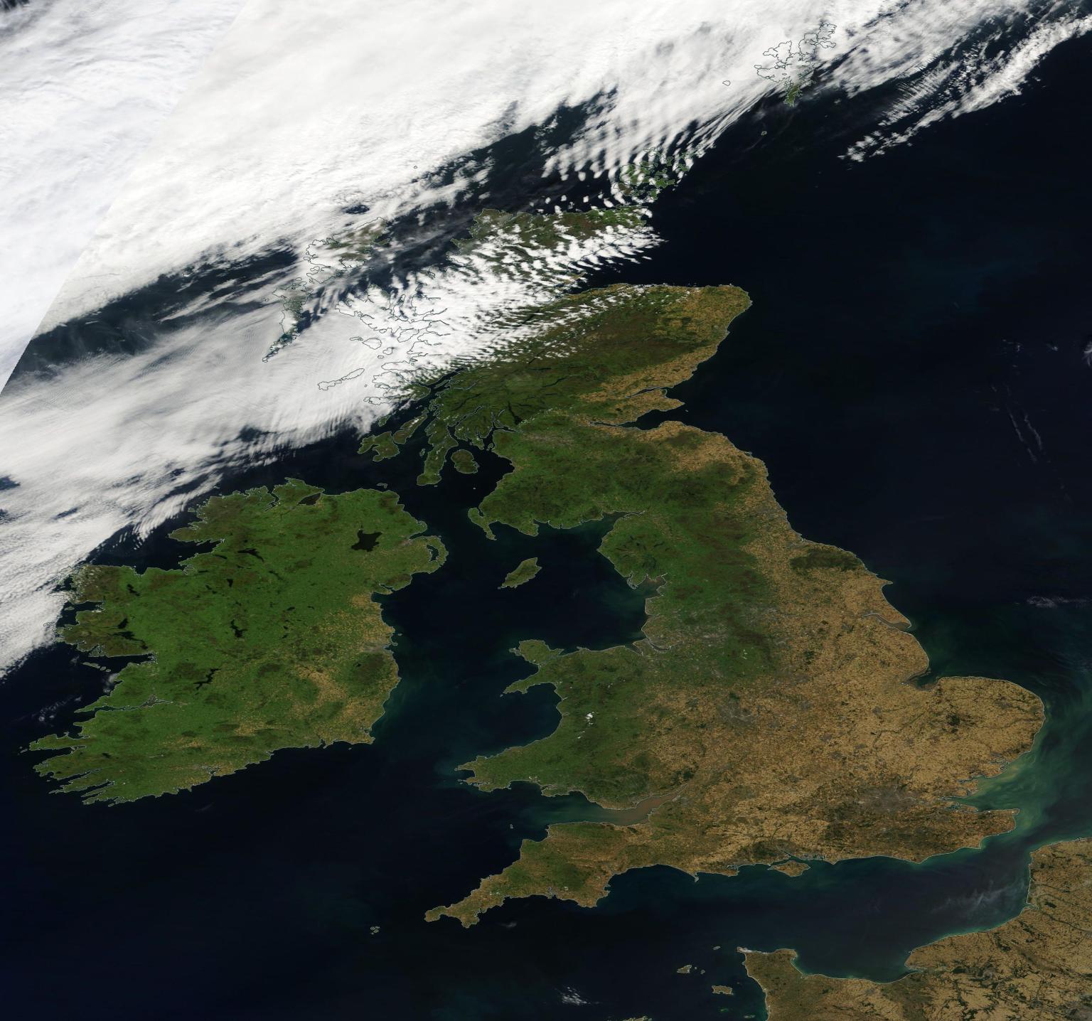 Satellite image of UK on 10 August 2022 showing scale of dry conditions that turned part of the landscape brown