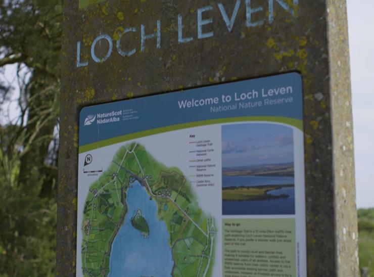 Sign with Welcome to Loch Leven and a map of the lake