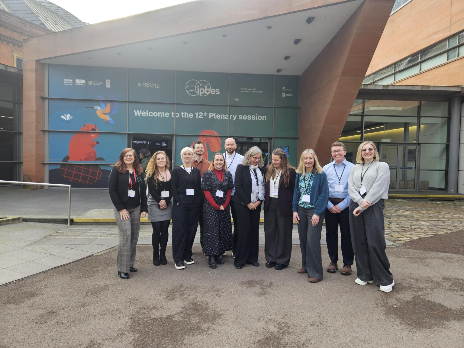 Group of people in front of a building