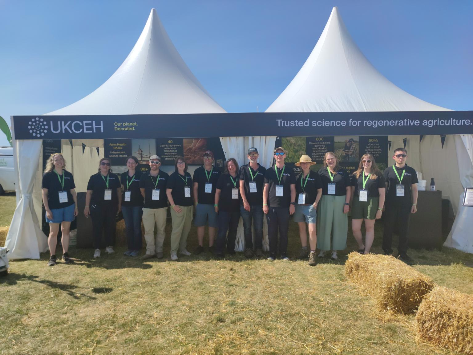 Group of people in front of a tent