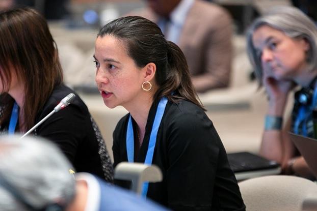 Dr Amanda Thomson of CEH listens as Dr Jolene Cook, Head of Climate Science - International, BEIS, addresses a session of the IPCC-49 in Kyoto Photo by IISDENB  Sean Wu