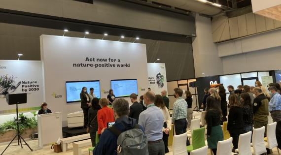 Attendees at COP15 Nature Positive pavilion