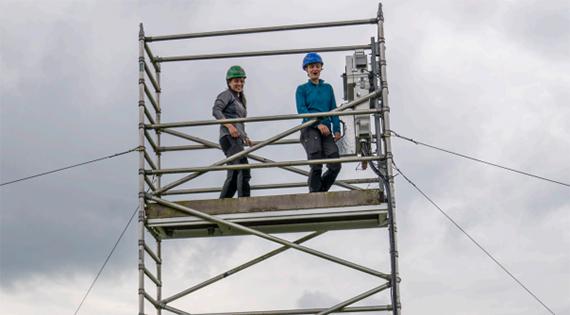 Two people on a tower