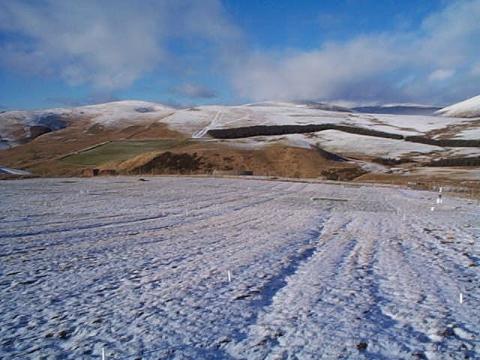 A snowy view of the Sourhope site during the winter