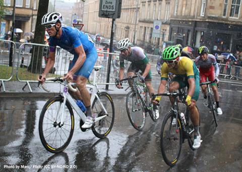 Cyclists competing during rain