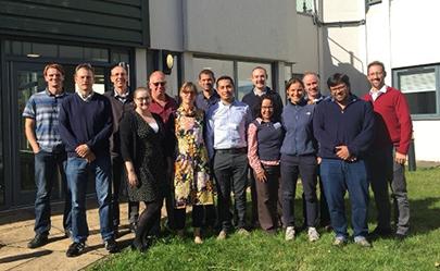 Group of researchers outside a building