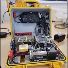A suitcase sized gas analyser machine
