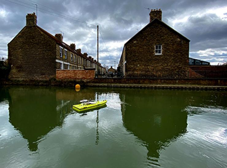 ARC boat being used for surveys on a river