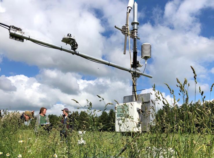 A flux tower for monitoring greenhouse gas emissions, located on farmland