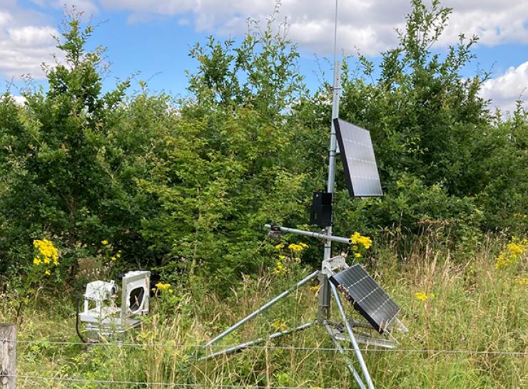 Biodiversity monitoring station in a field