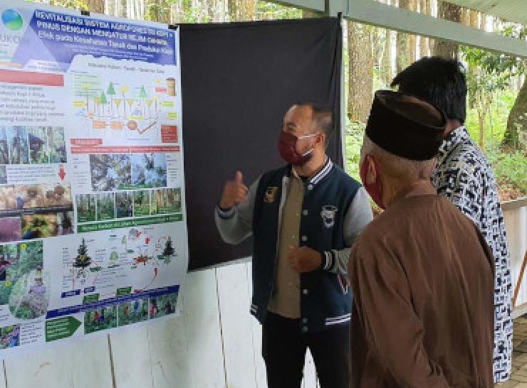 UB Forest presenting science poster to local stakeholders