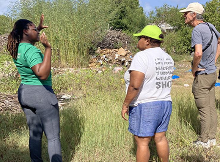 Zoya Buckmire (left) from Anguilla Department of Natural Resources speaks to workshop participants on a field excursion