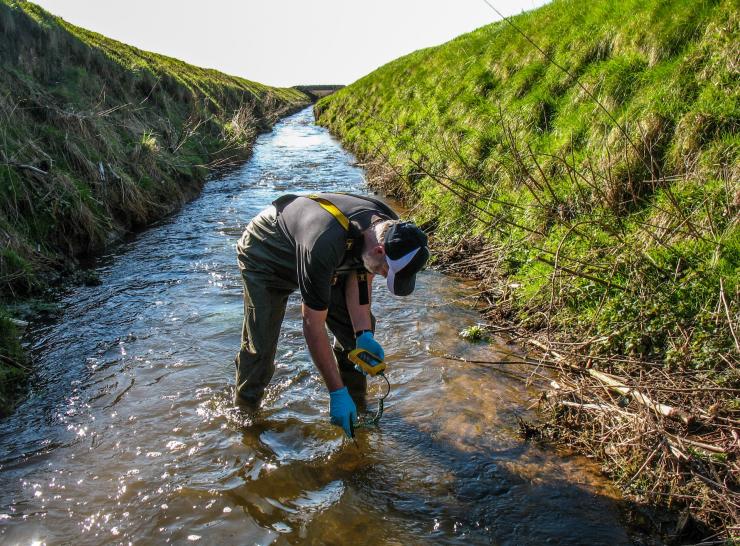 Man stod in shallow river testing