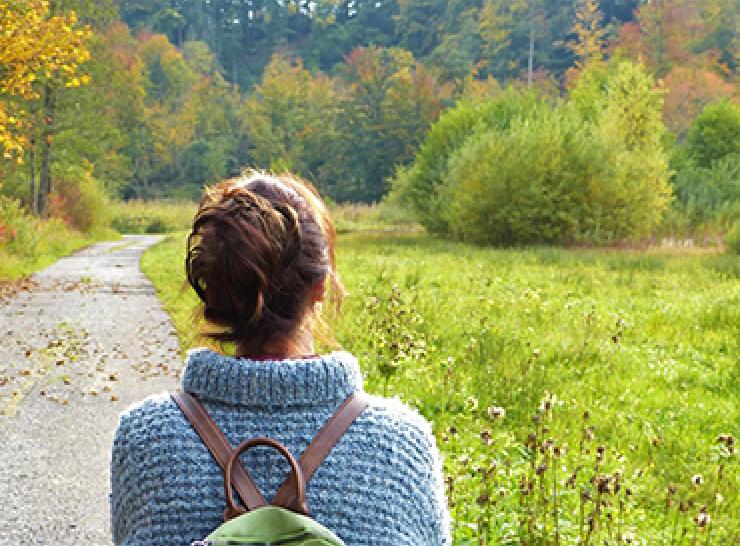 Woman looking at trees