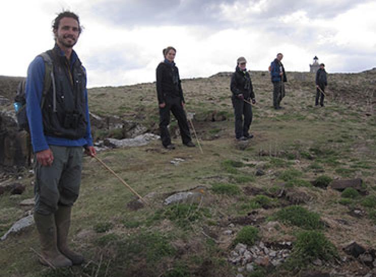 UKCEH staff and volunteers counting occupied puffin burrows for 2013 Isle of May survey